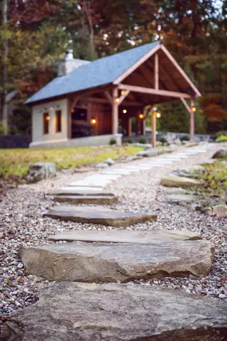 Stone steps leading to the plunge pool and gazebo