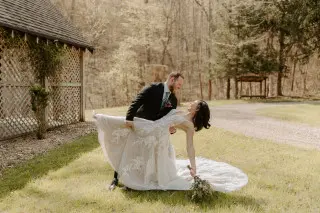 Groom dipping his bride