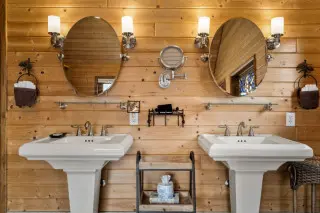 His and Hers sinks and mirrors. Sconce lights by the mirrors