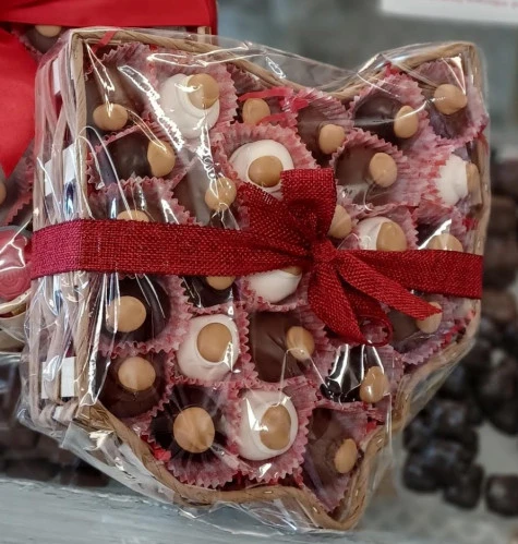 Decorative Ohio shaped basket filled with chocolate buckeyes