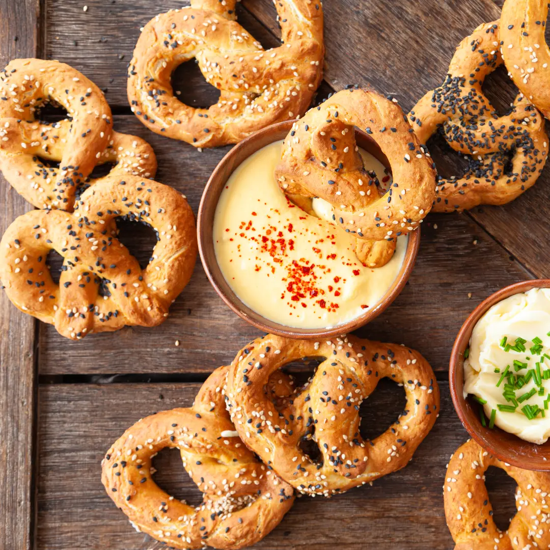 photo of a soft pretzels and cheese dips