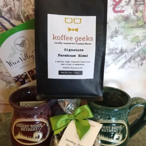 image of a bag of coffee and 2 mugs
