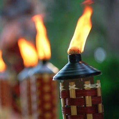 image of lit tiki torches