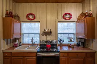 Kitchen with stove, sink, counterspace