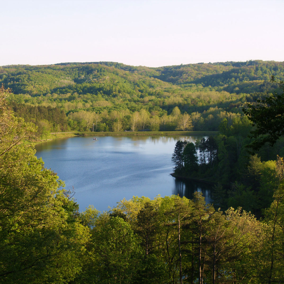 Photo of a lake nestled in the wayne national forest at Lake Hope State Park