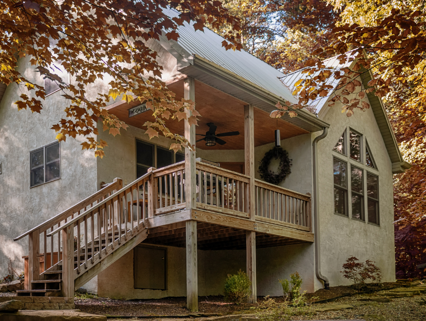 Cherry Ridge Retreat Oak Ridge Cabin exterior, with fall colors on the leaves surrounding