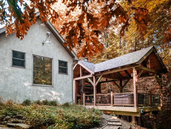 Fall colors on the leaves, cabin and hot tub