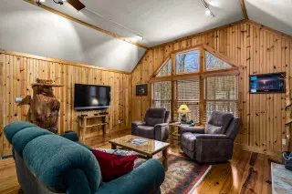 Stone covered face of Ravine's Edge luxury cabin