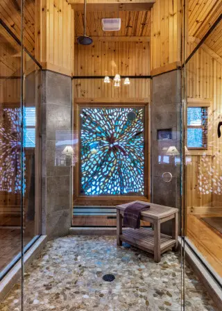 All glass walk in shower with stained glass inlay